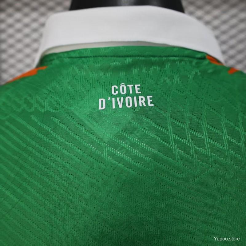 Player Version 2025 Ivory Coast Green with Elephant Graphic and Orange Trim Jersey
